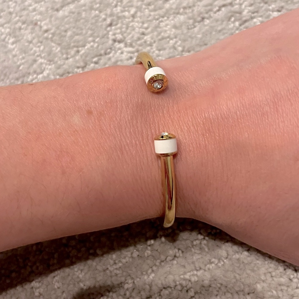 Henri Bendel gold and white enamel cuff